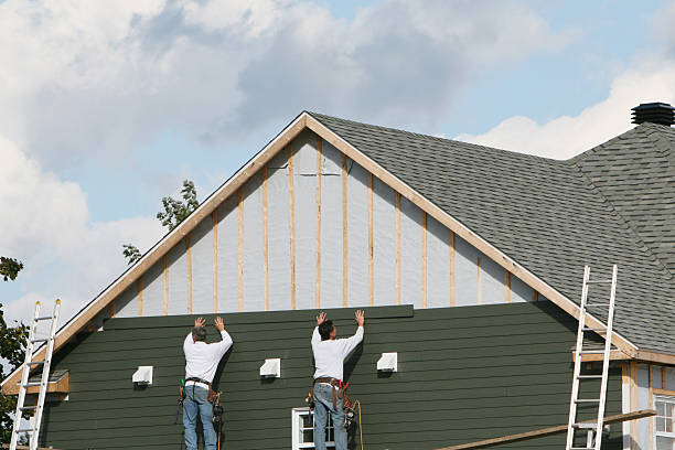 Professional Siding technician working in Saugus, MA